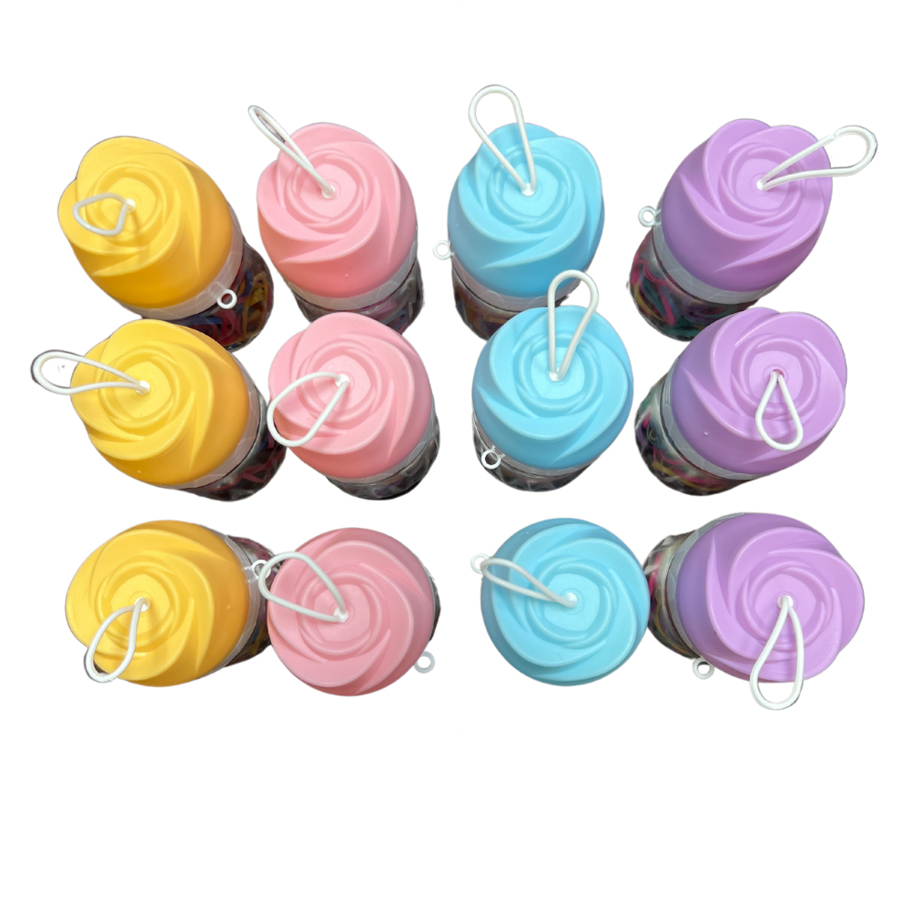 Ligas grandes elasticas plásticas suave en botellita de rosa para cabello X 12 botellitas (42A-6)