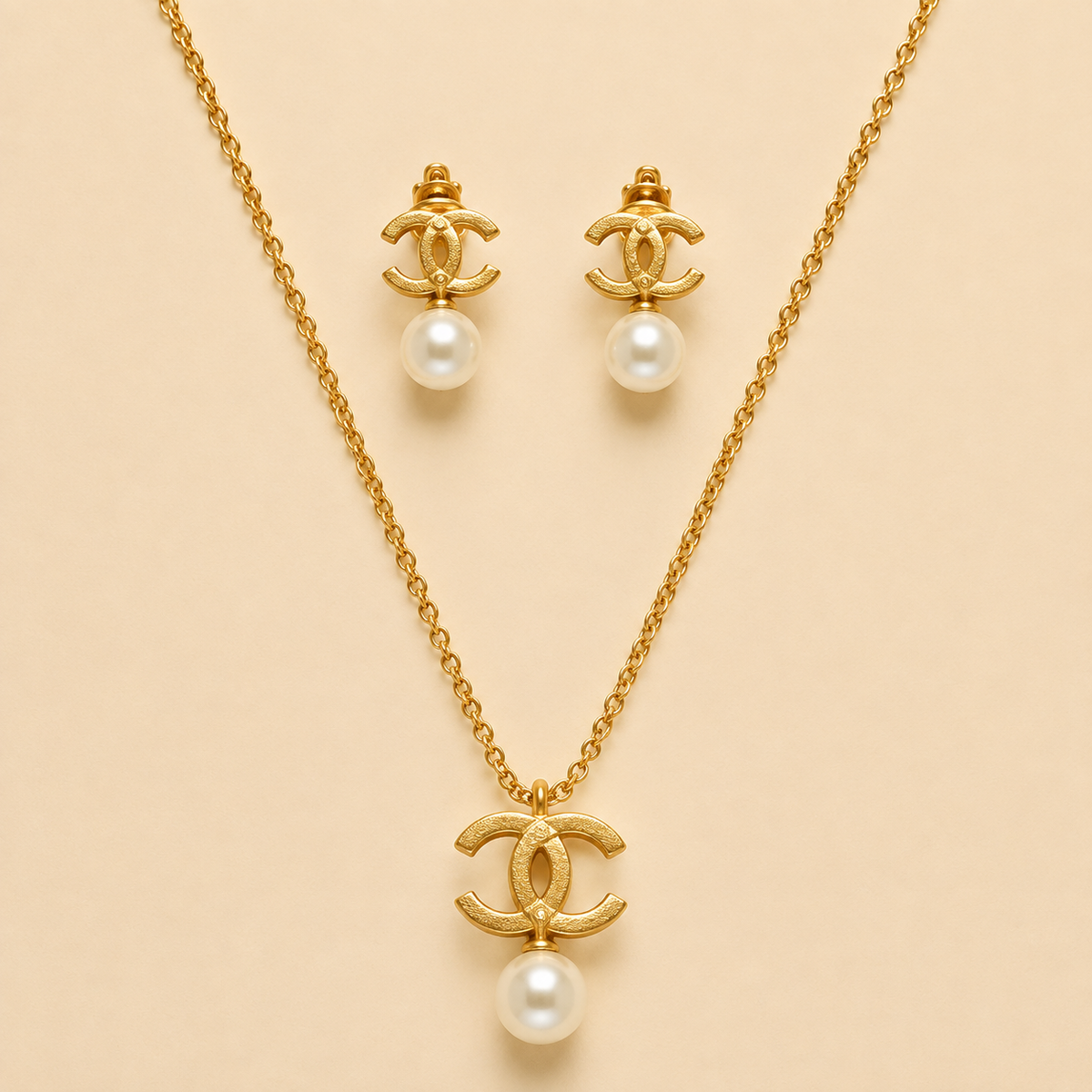 Juego de cadena y aretes dorado de acero quirúrgico (COD.88-124)