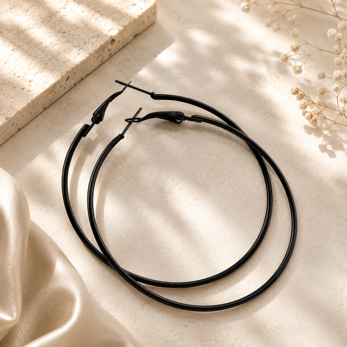 Argollas negra de 7 cm tira x 12 pares (27C-7)