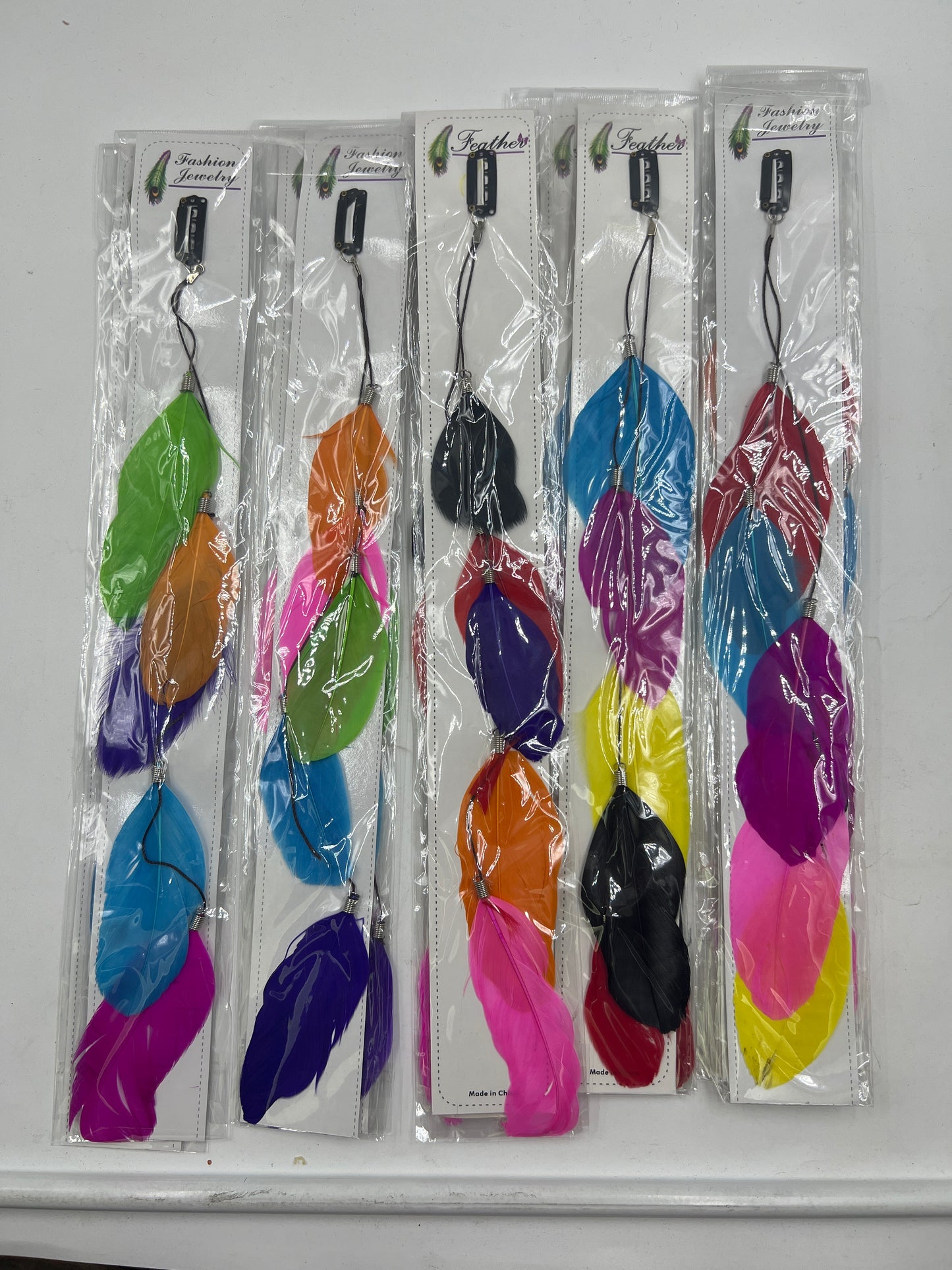 Vinchas con plumas de colores colgantes paquete de 12 unidades (N-1)