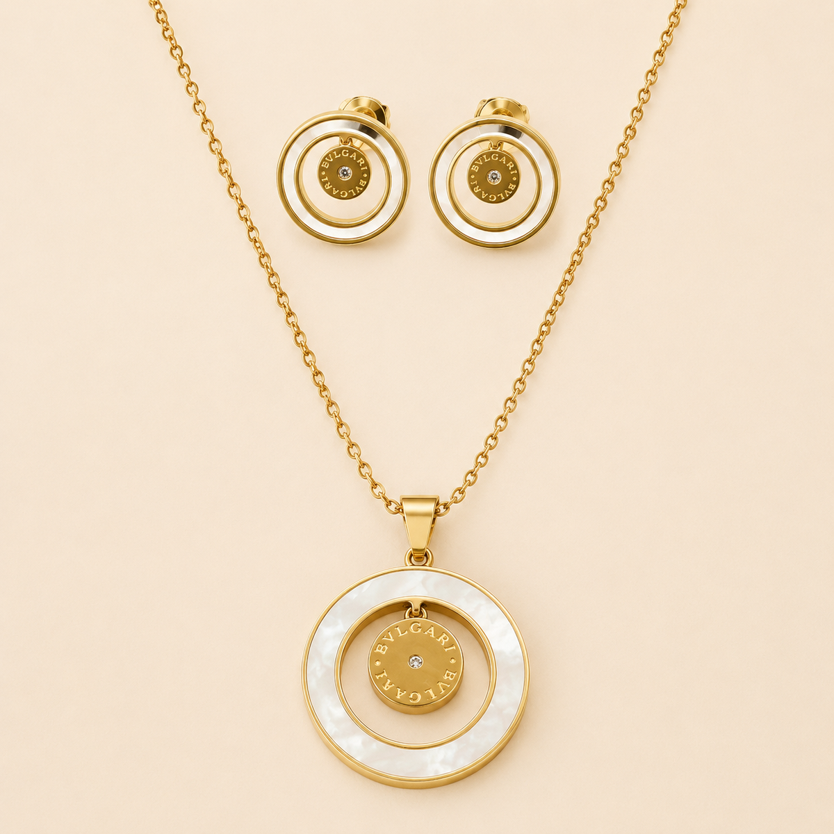 Juego de cadena y aretes dorado de acero quirúrgico (COD.88-147)