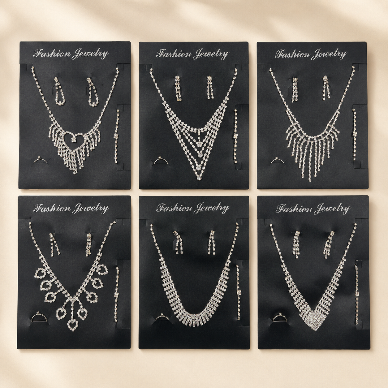 Set de cadenas y pulseras con aretes y anillo paquete x docena (71-1)