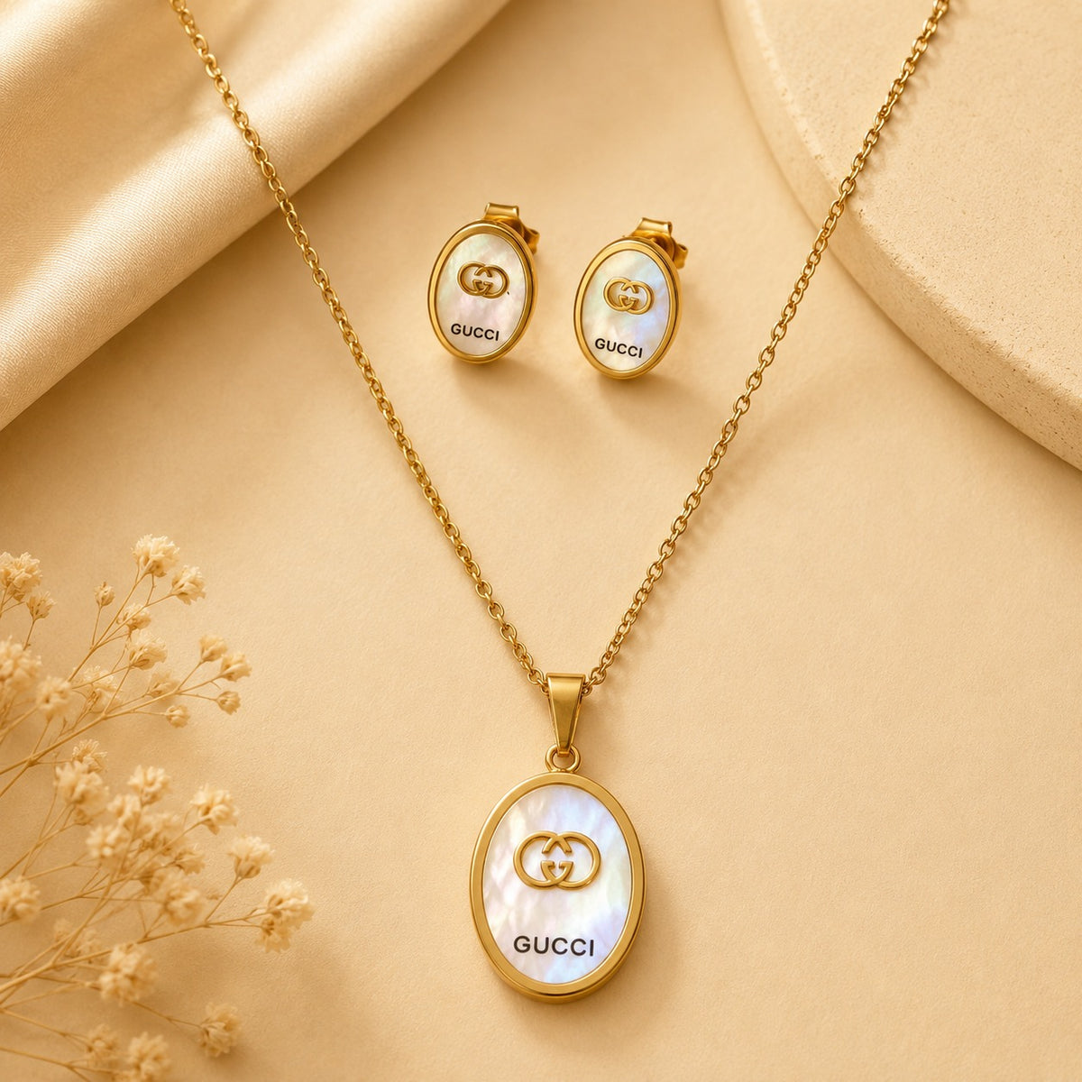 Juego de cadena y aretes dorado de acero quirúrgico (COD.88-145)