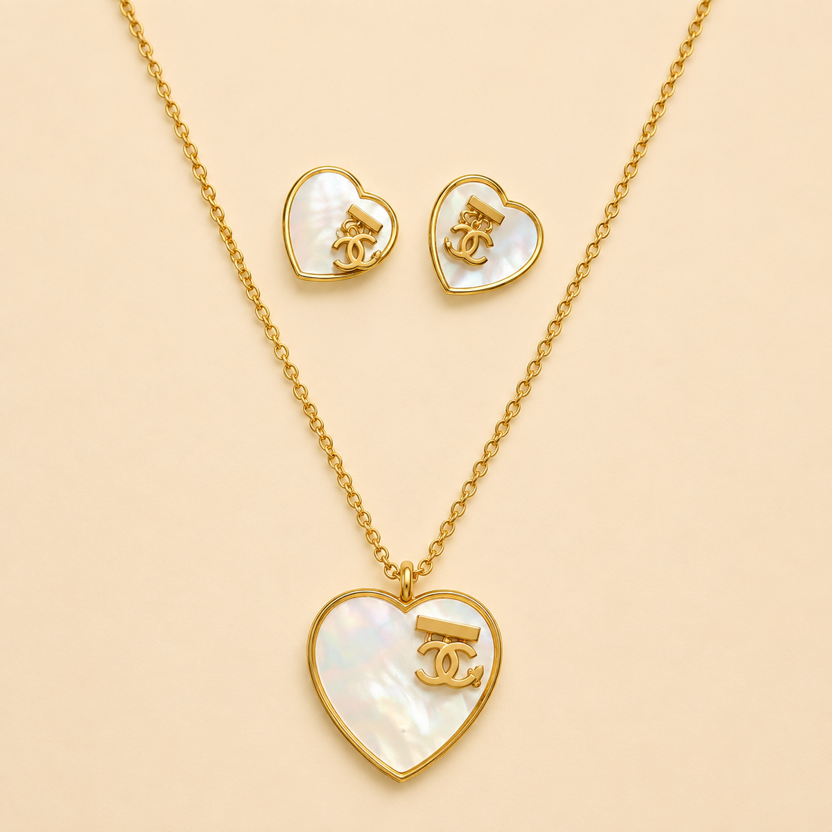 Juego de cadena y aretes dorado de acero quirúrgico (COD.88-151)