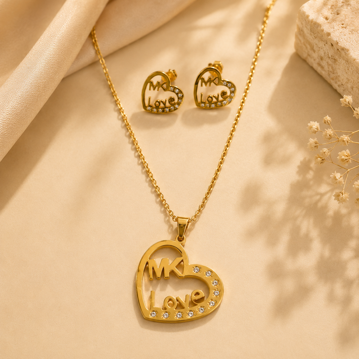 Juego de cadena y aretes dorado de acero quirúrgico (COD.88-86)