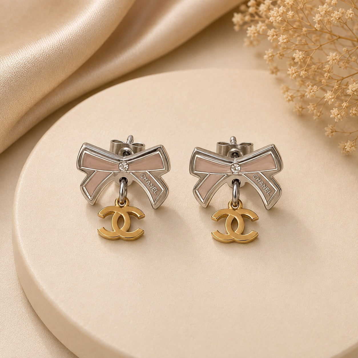 Aretes de lazo plateado de acero quirúrgico (COD.88-211)